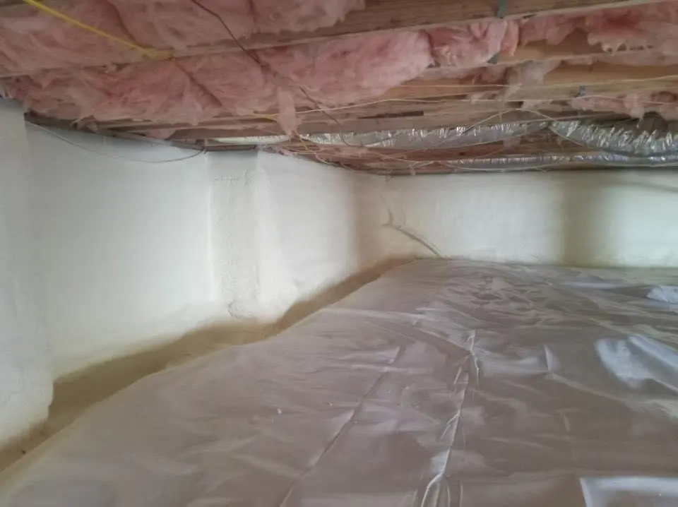 Crawl space encapsulation with closed-cell spray foam for Commercial Roof Restoration in Riviera Beach